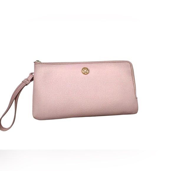 lululemon Handbags - Lululemon Athletica Pink Zip Wallet